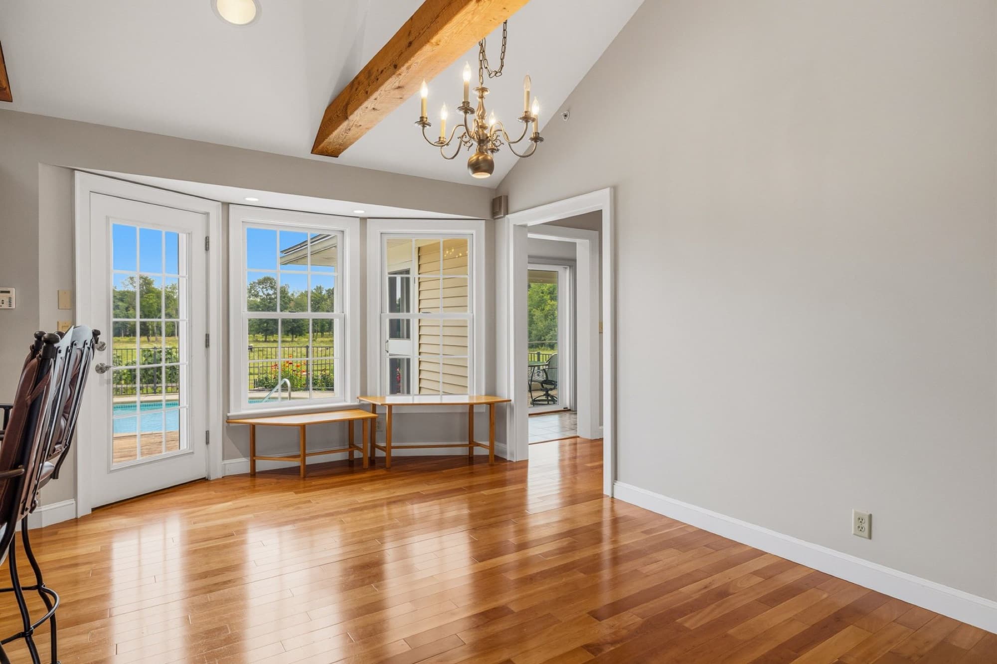 The dining room bay window and the door to the screened porch