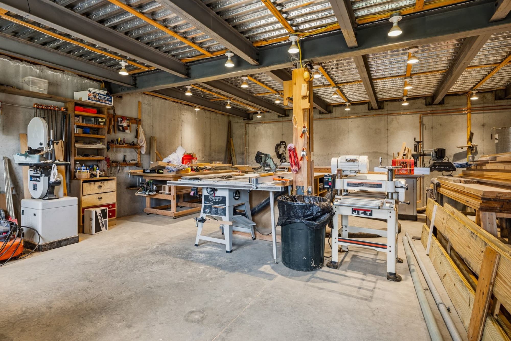 The walkout woodworking shop beneath the garage